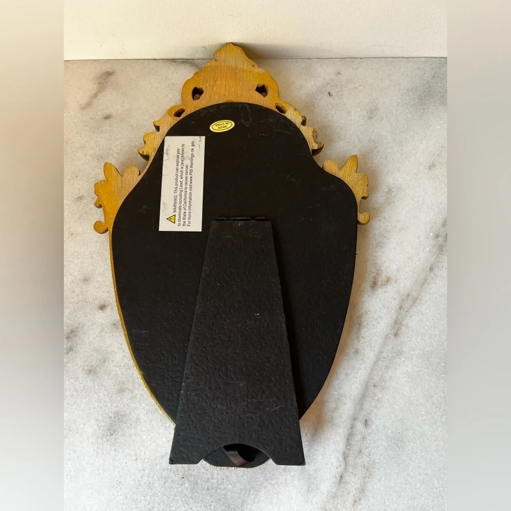 Ornate Gold and Black Decorative Mirror